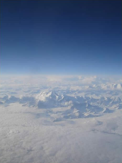 Snowy Peaks Seen from an Airplane